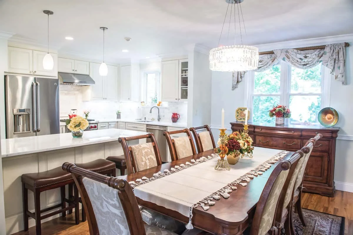 White kitchen cabinets, peninsular, hidden Microwave drawer and Quartz countertops kitchen