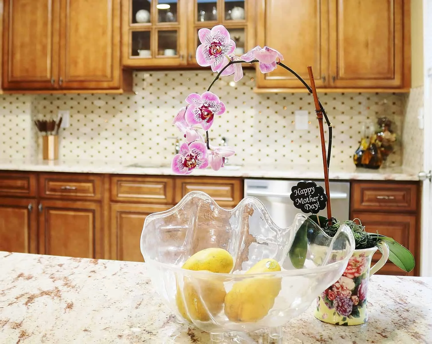 Traditional cherry kitchen remodel with granite countertops and diamond tile backsplash