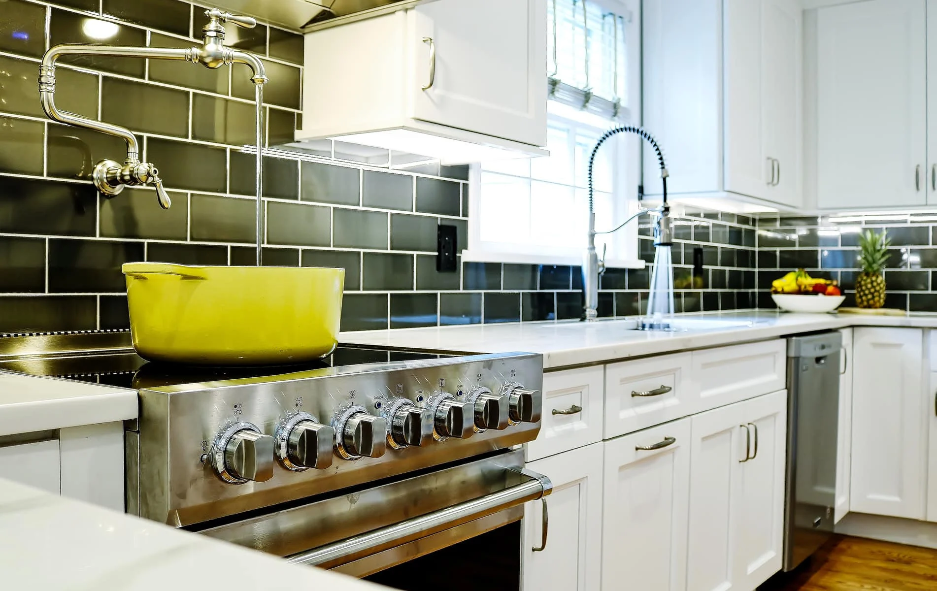 Larchmont NY kitchen remodel with white cabinetry and green subway tile backsplash