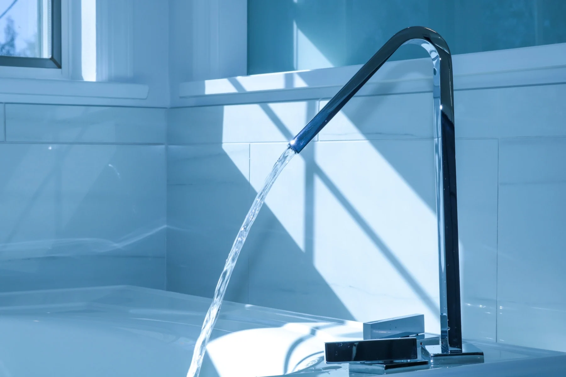 Modern bathroom remodel New Rochelle NY freestanding tub with floor mounted faucet
