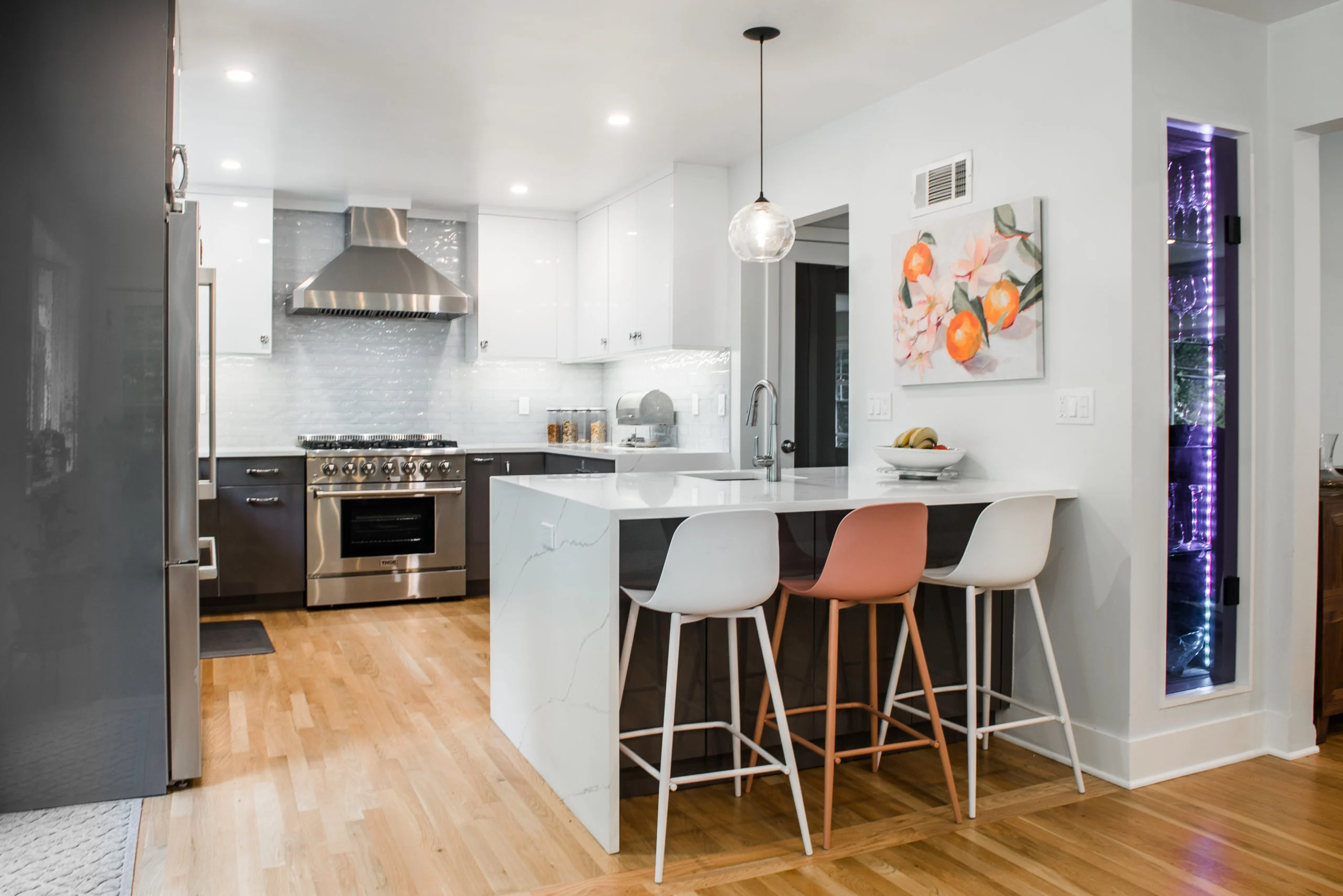Contemporary kitchen remodel in New Rochelle NY with white island seating and improved open layout
