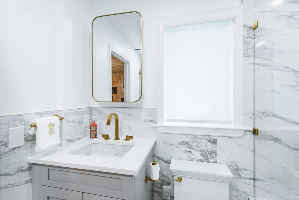 RAJ_240608-90 Marble tile with brass hardware bathroom remodel