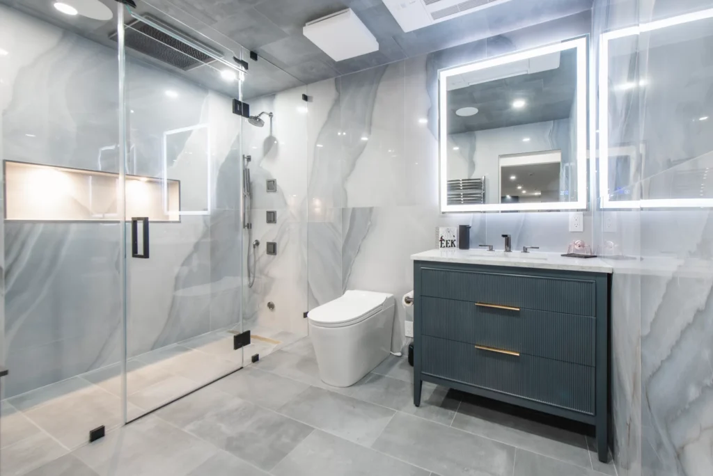 basement-bathroom-renovation-westchester Spa-style basement bathroom with steam shower and heated floors.