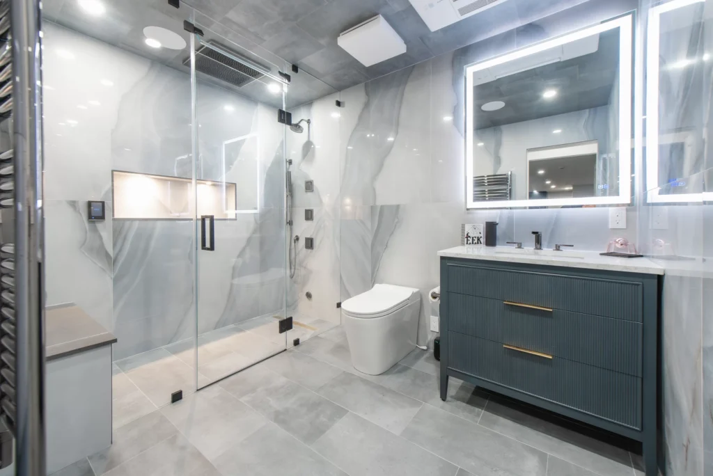 basement-bathroom-renovation-westchester Spa-style basement bathroom with steam shower and heated floors.