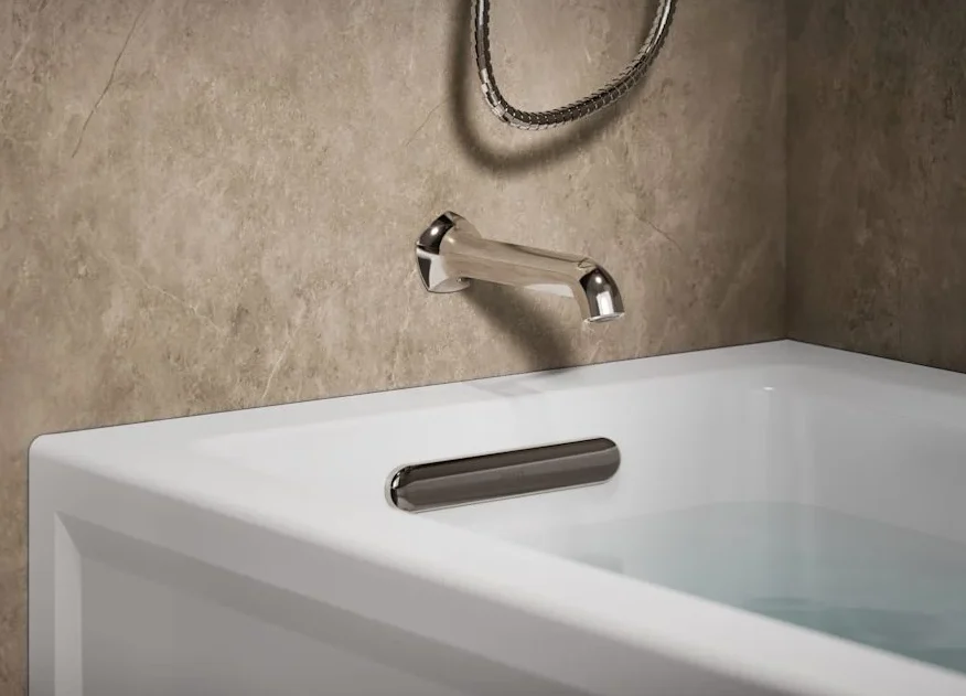 Tub with matte-black wall-mounted spout